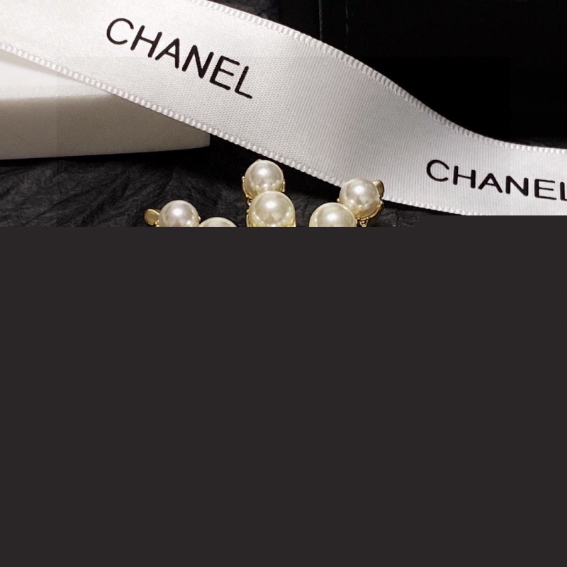 Ch*el brooches